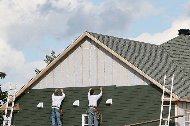 Professional Storm Damage Siding Repair technician working in Wayne, PA